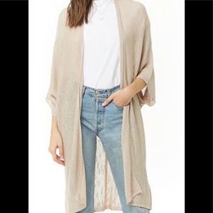Beautiful cream colored knitted cardigan